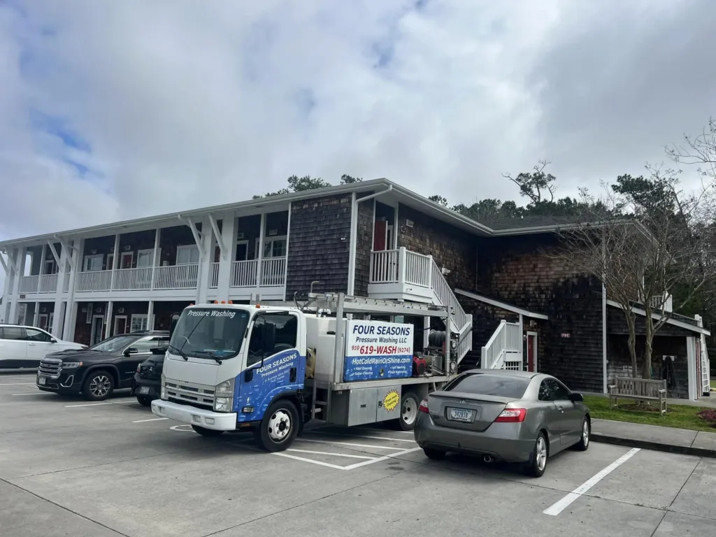 power-washing-truck-on-location-at-residential-driveway-by-swimming-pool-wilmington-nc power-washing-truck-on-location-at-residential-driveway-by-swimming-pool-wilmington-nc
